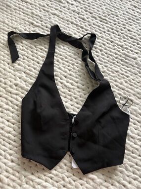 Olia
Black Halter Crop Top with Smocked Back
Small
NWT